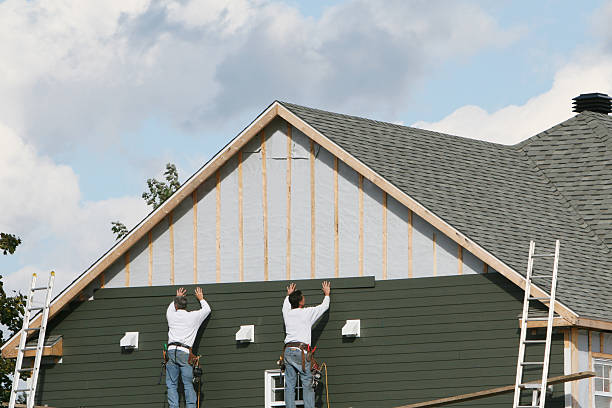 Professional Siding technician working in Wingate, NC